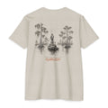 Sand Backwater Poling Shirt back with angler poling a skiff through a cypress swamp