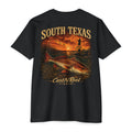 Black South Texas fishing shirt featuring trophy redfish, Laguna Madre flats, sunset, and poling skiff artwork