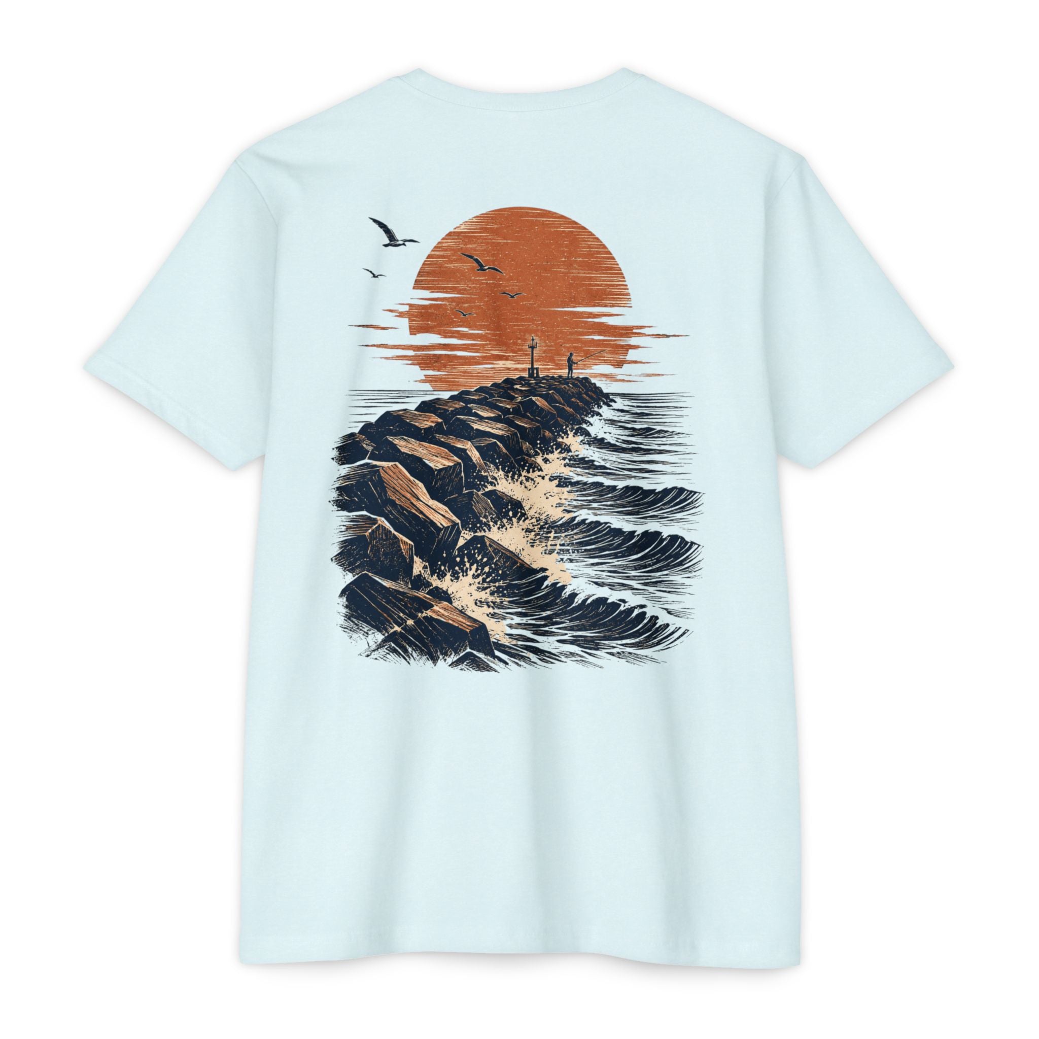 Ice blue Port Aransas Jetty Sunset fishing shirt featuring crashing Gulf waves, granite jetties, seabirds, and a coastal sunset