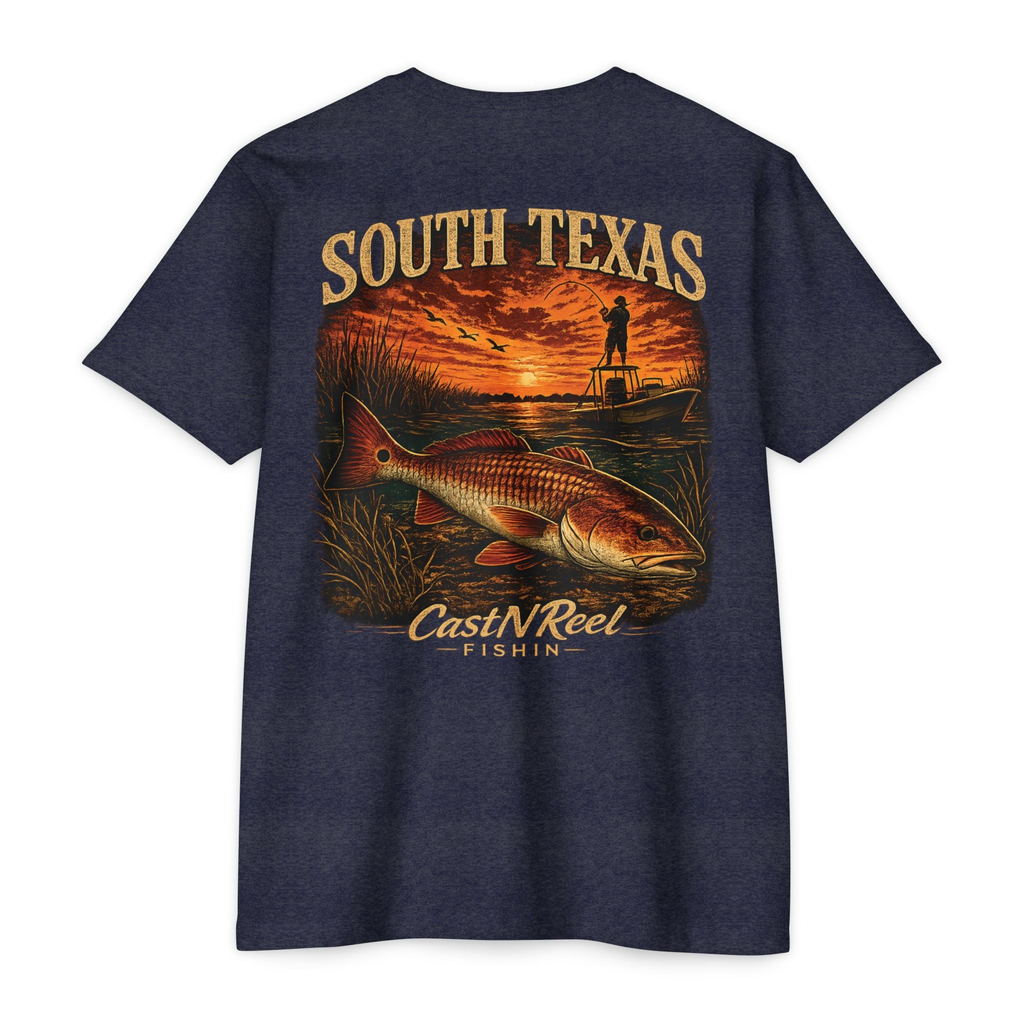 Midnight navy South Texas fishing shirt featuring trophy redfish, Laguna Madre flats, sunset, and poling skiff artwork