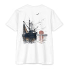 White vintage shrimp boat sunset fishing shirt featuring a Gulf Coast shrimp trawler on calm coastal waters at sunset